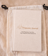 Pregnancy journal in a drawstring bag with OKANA CARE branding.