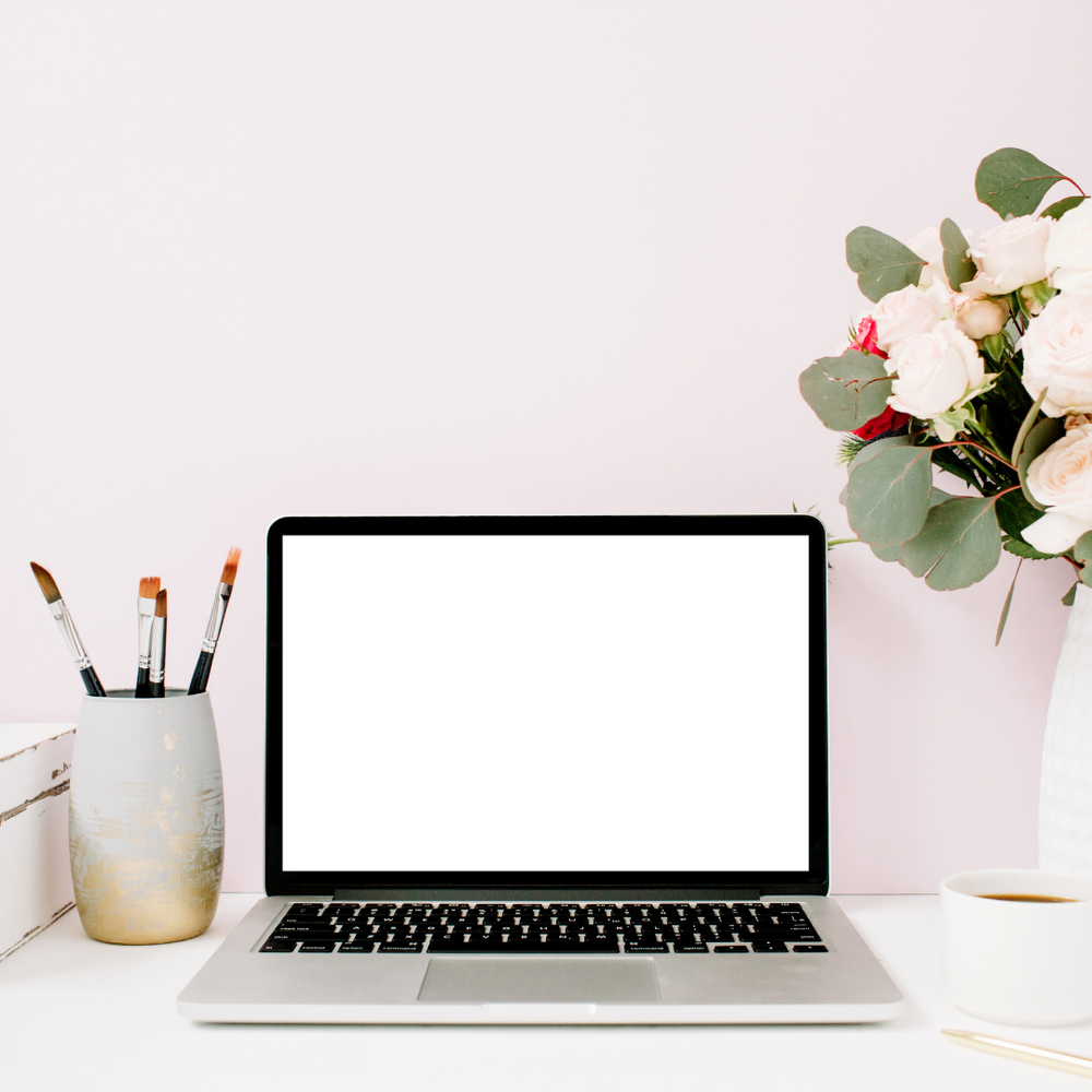 Laptop and flowers representing Okana Care online resources