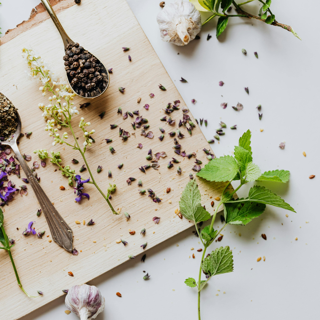 Herbs and botanical ingredients arranged for integrative postpartum support
